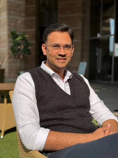 Ramalingam Subramanian, seated outdoors